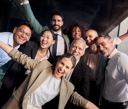 portrait-of-excited-funny-multi-ethnic-staff-peopl-2025-01-07-23-11-16-utc-e1739179475423.jpg